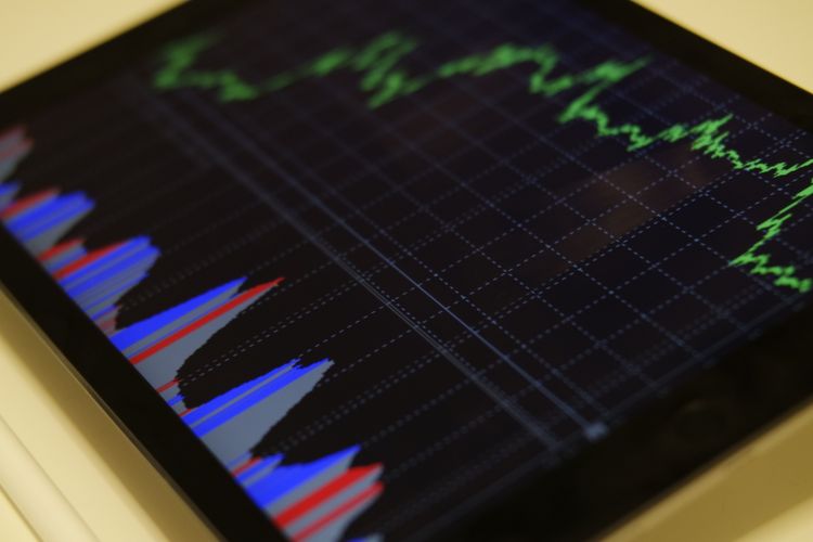 Laptop screen showing market research dashboard tools